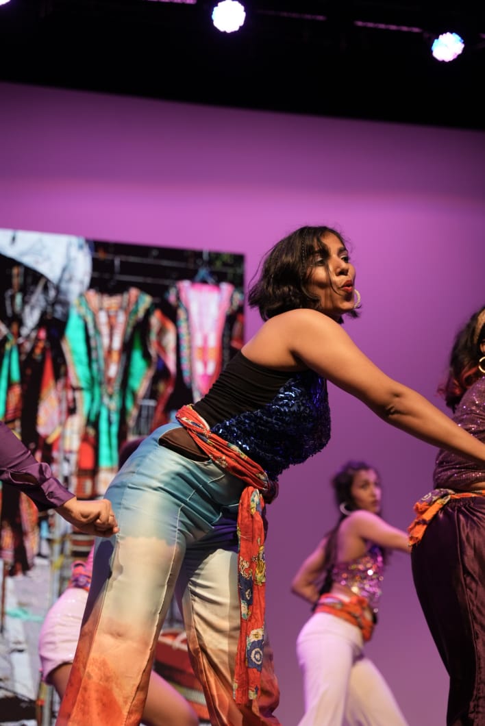 Pooja performing on stage